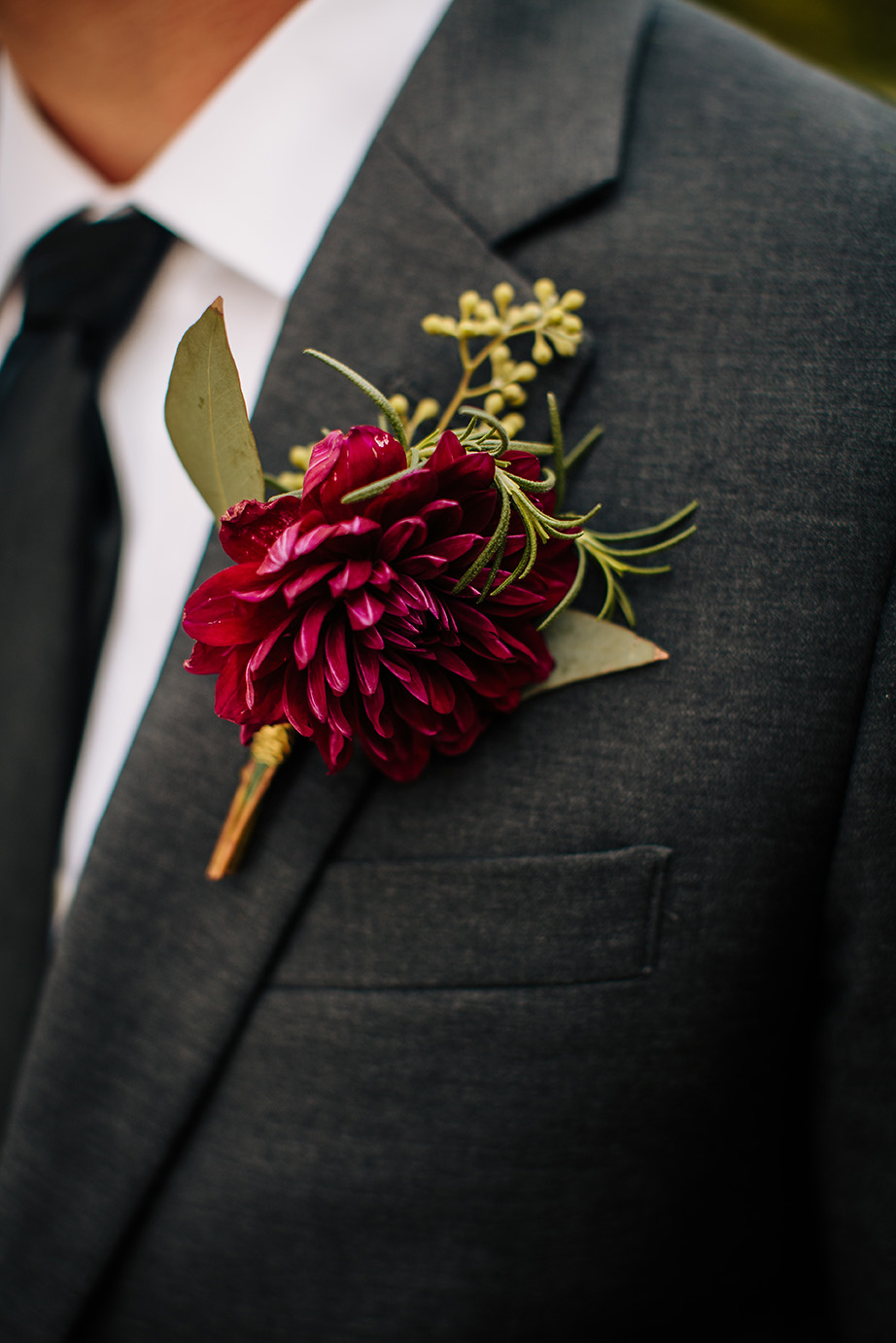 Kevin's Burgundy Dahlia Grooms Boutonniere