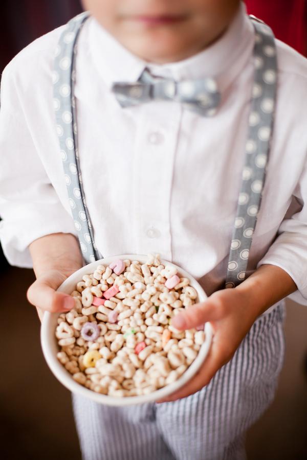 Boy Holding Bowl of Lucky Charms