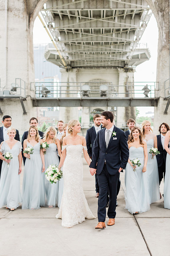 Lauren and Oscar With Wedding Party Under Pedestrian Bridge