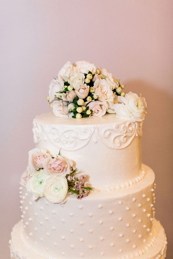 White Swiss Dot Wedding Cake Top Tier With Pink and White Florals