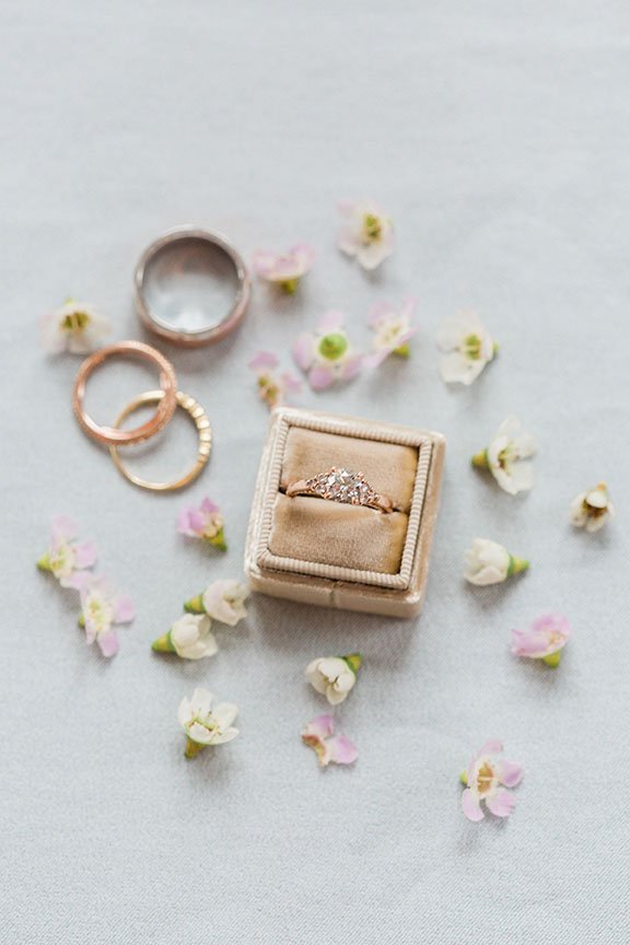 Wedding Rings with Rose Petals Flat Lay