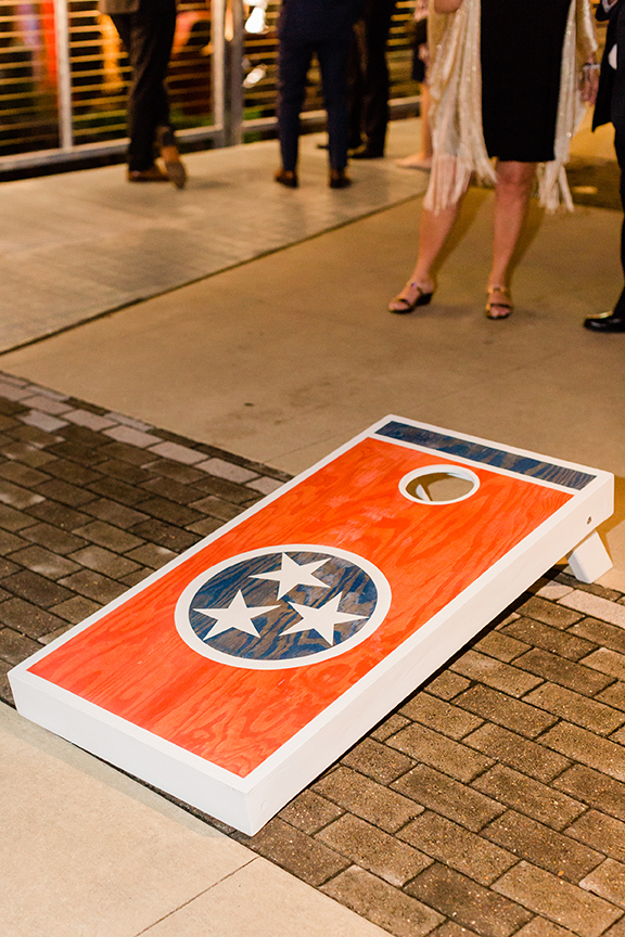 Corn Hole Game on Riverfront Patio