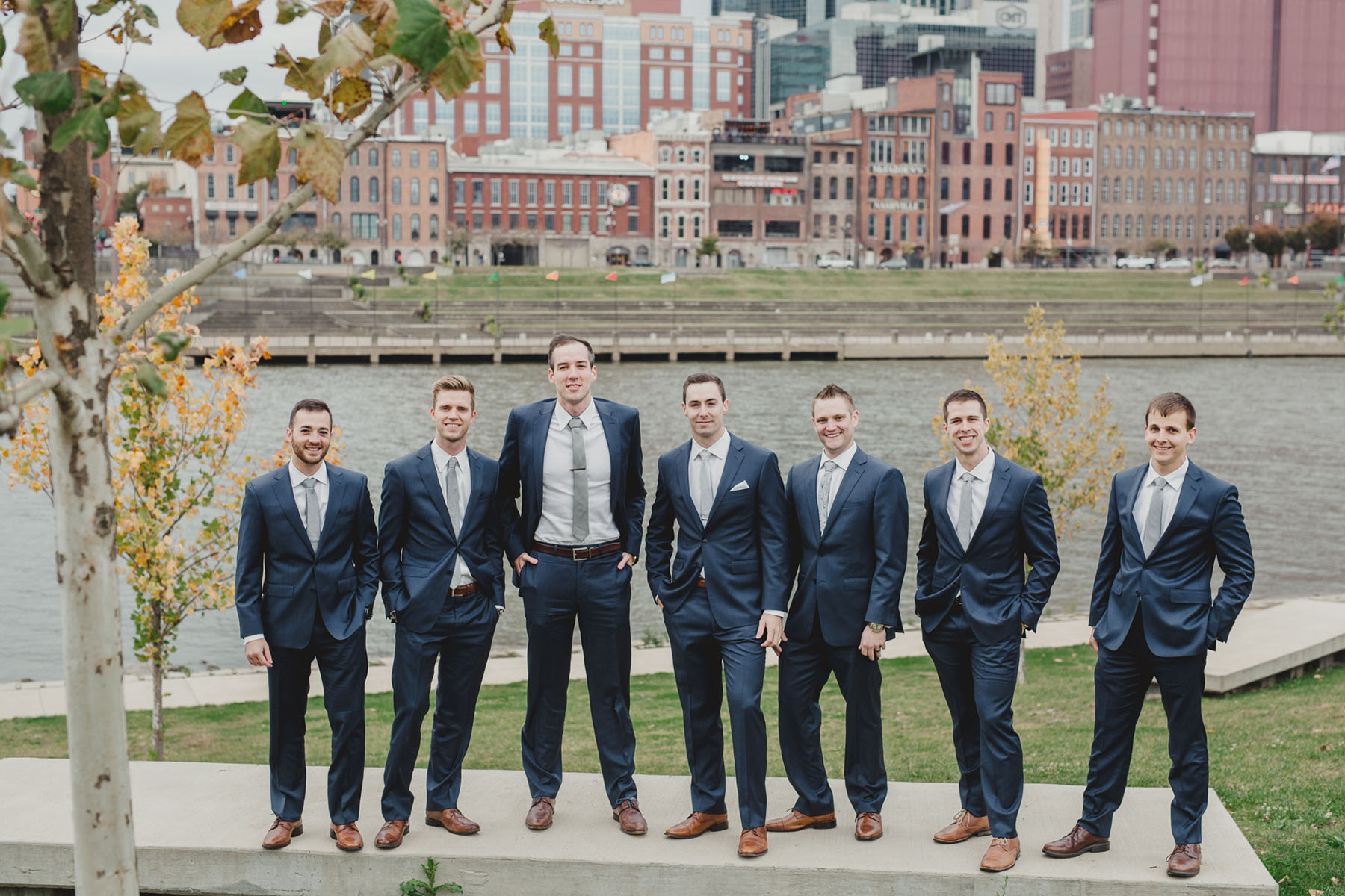 Taylor with Groomsmen on Riverfront