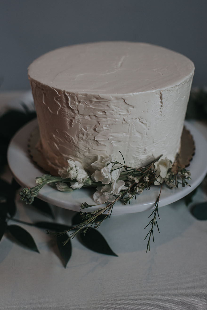 Rustic White Textured Wedding Cake with Greenery