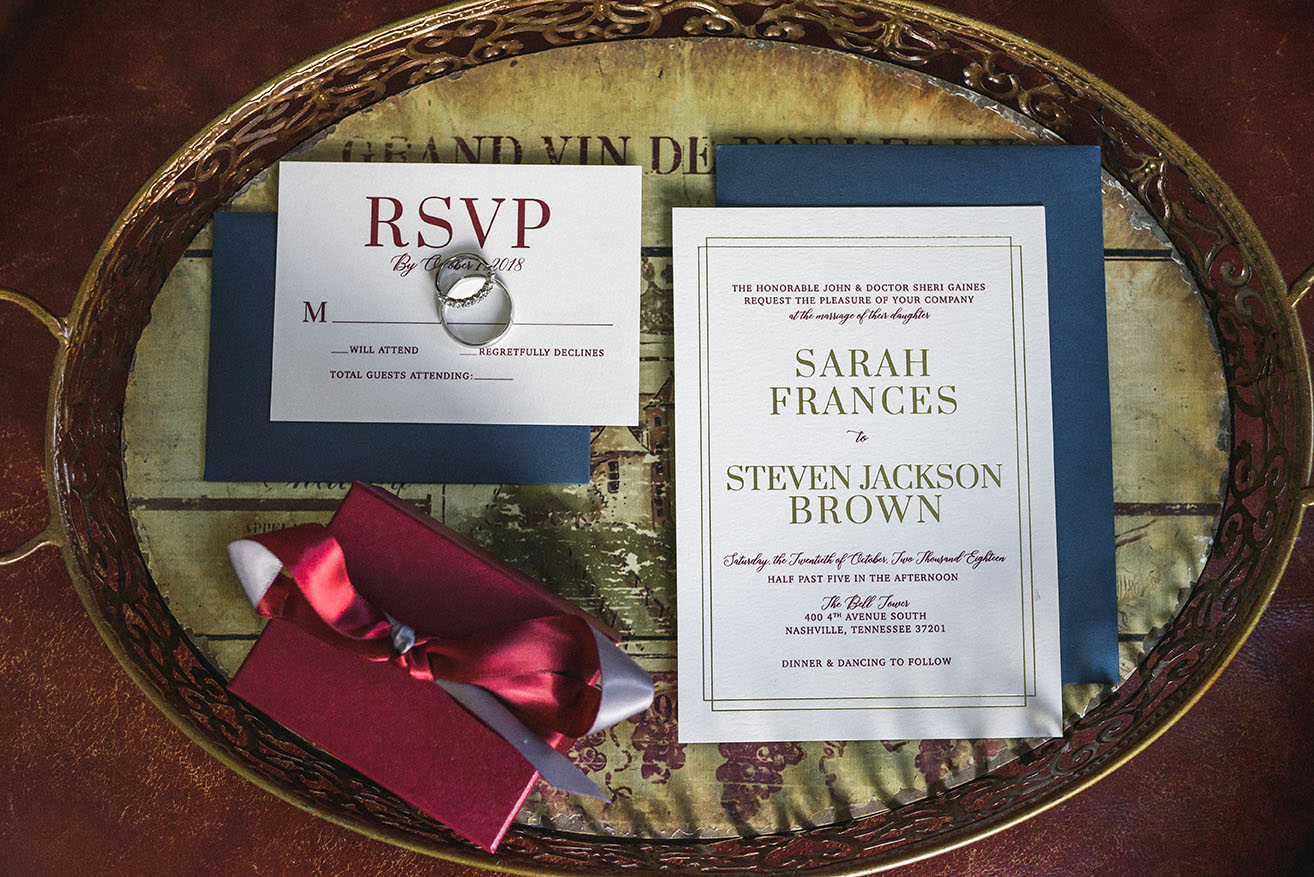 Sarah Frances and Jackson's Burgundy and Navy Wedding Invitation Suite Flat Lay
