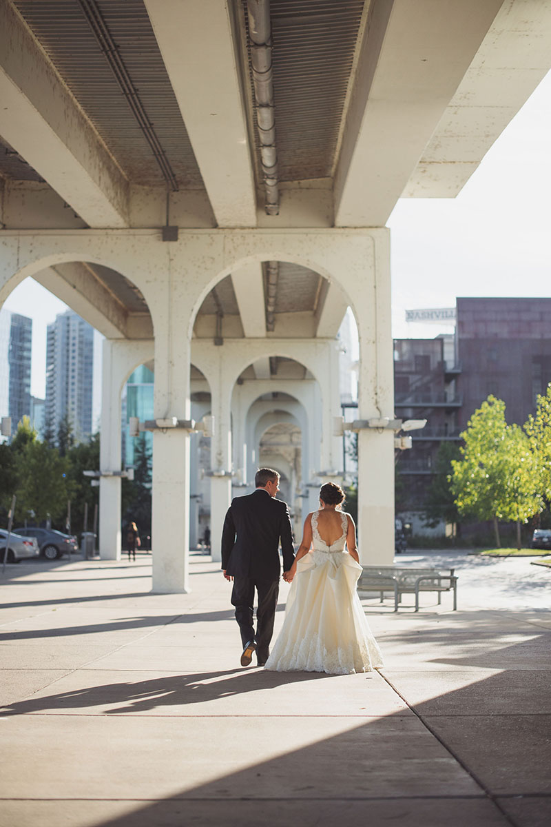 Cindy and Steven Walking Under Pedestrian Bridge