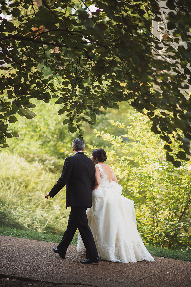 Cindy and Steven Walking Through Park