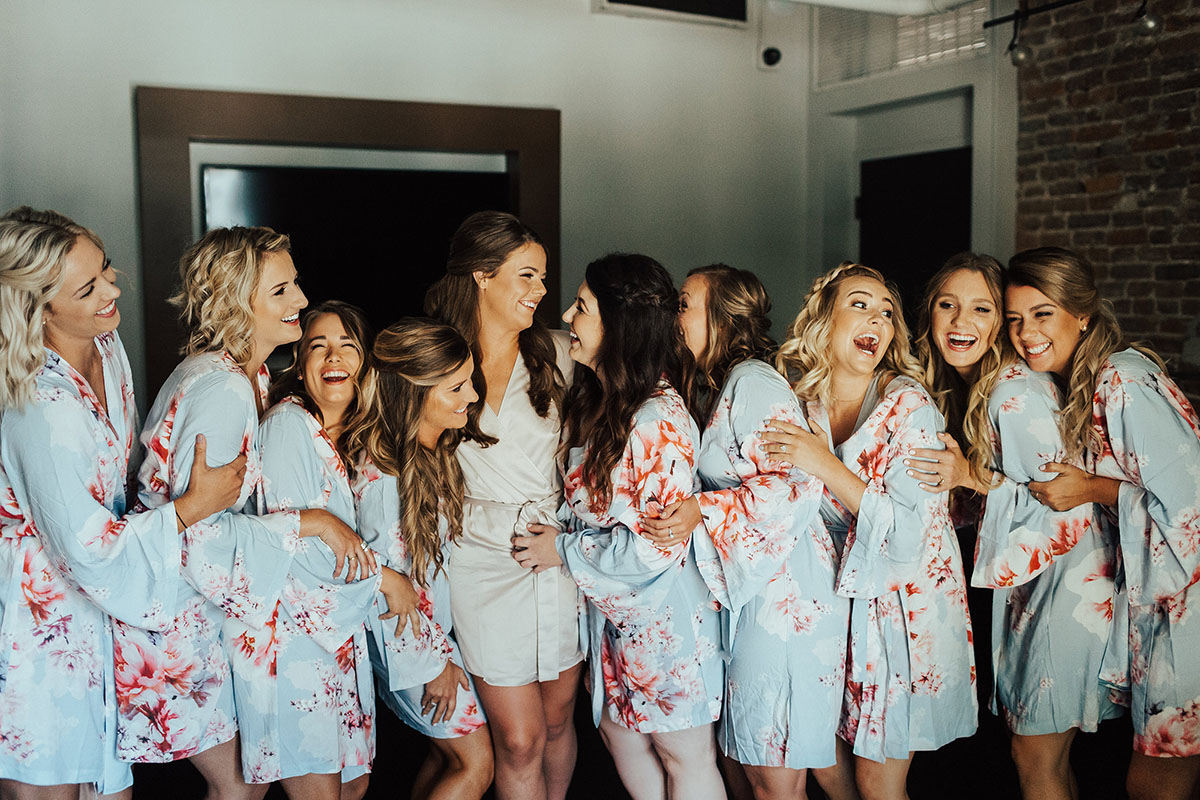 Amanda Getting Ready with Bridesmaids in Matching Floral Robes