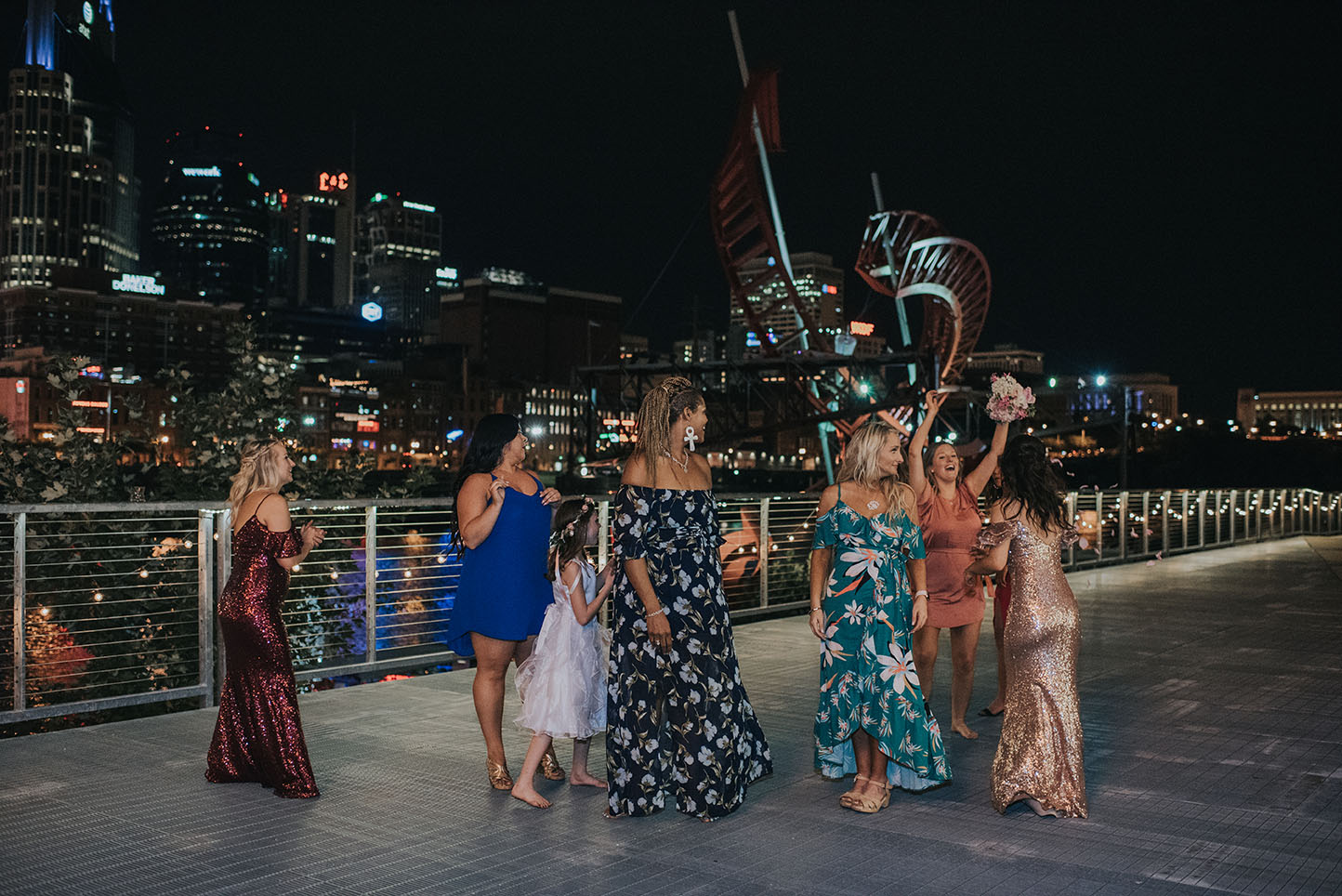 Bridesmaid Catching Bouquet on Riverfront