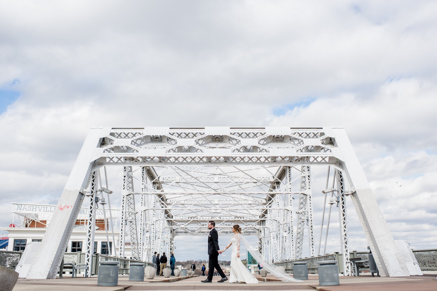 Fallyn and Aaron Walking on Bridge