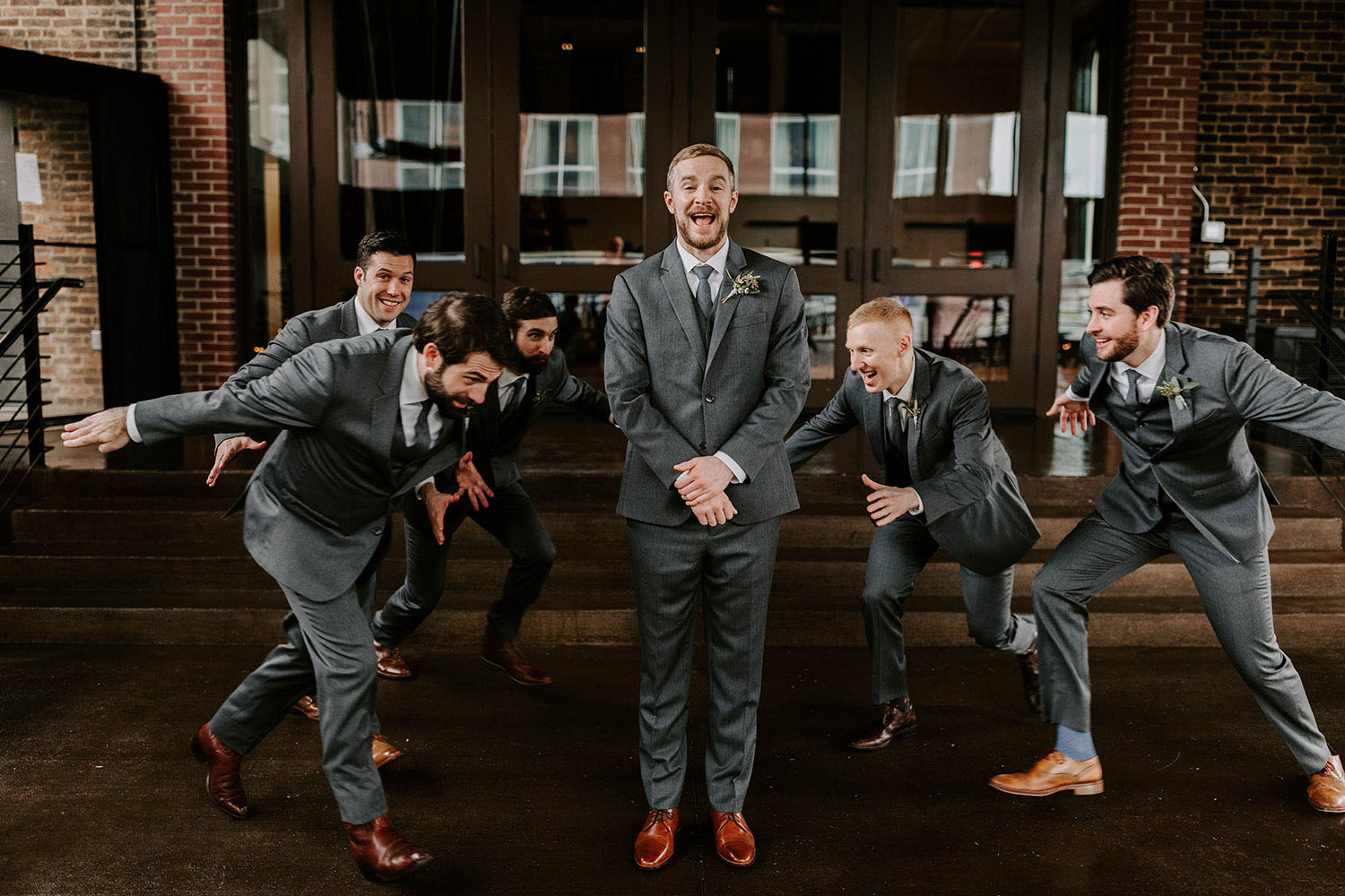 Groomsmen Running Towards Danny