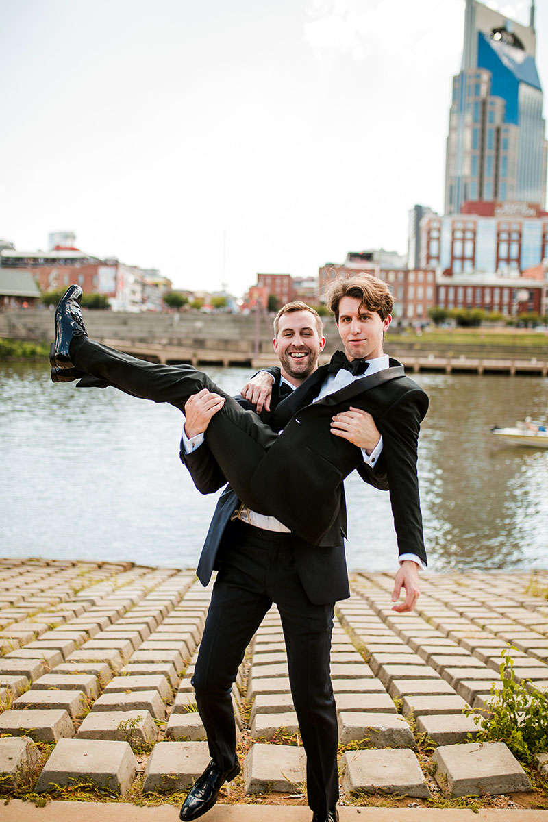 Clayton Holding His Best Man on Riverfront