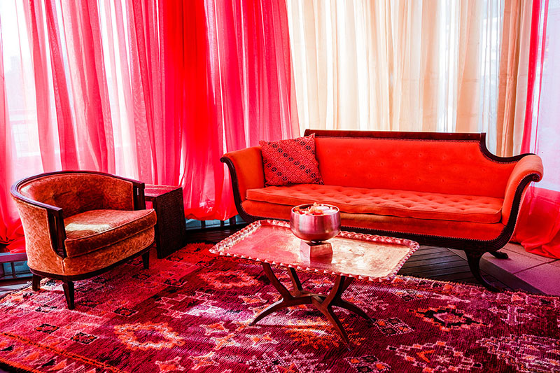 Moroccan Style Lounge Area with Red Draping