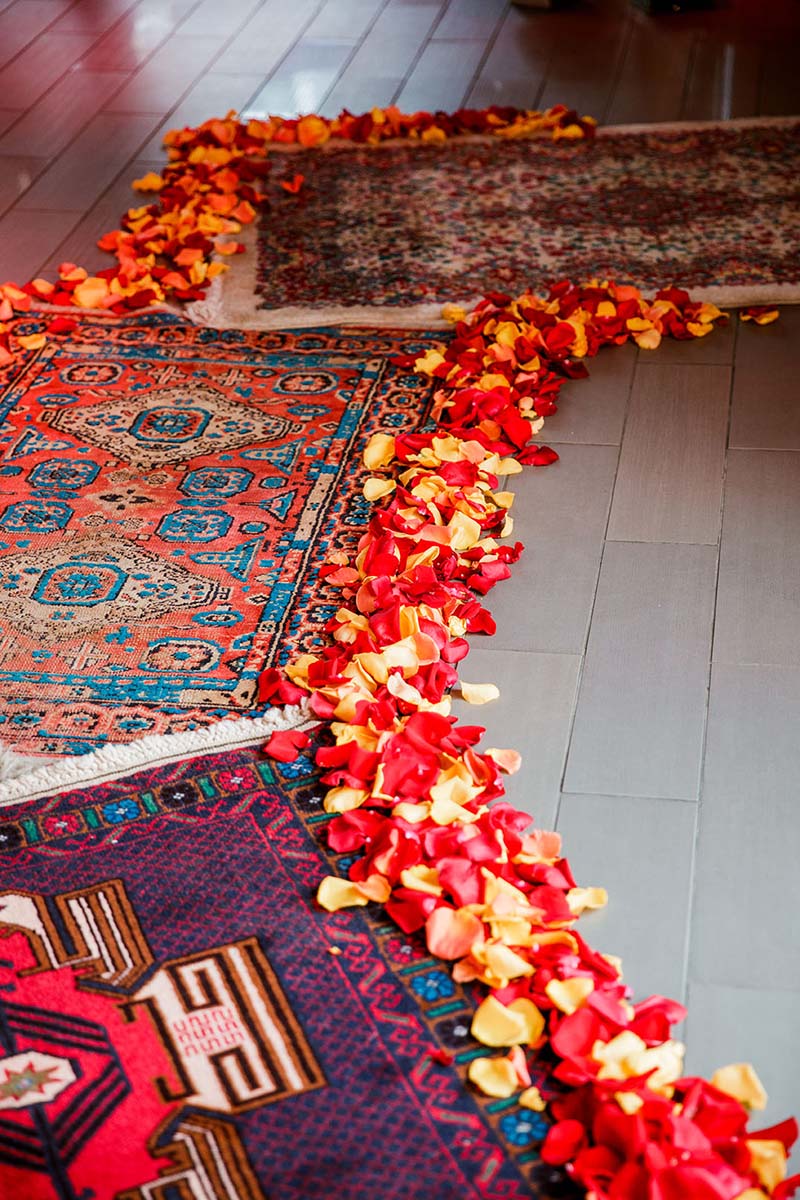 Moroccan Rugs with Sunset Colored Rose Petals