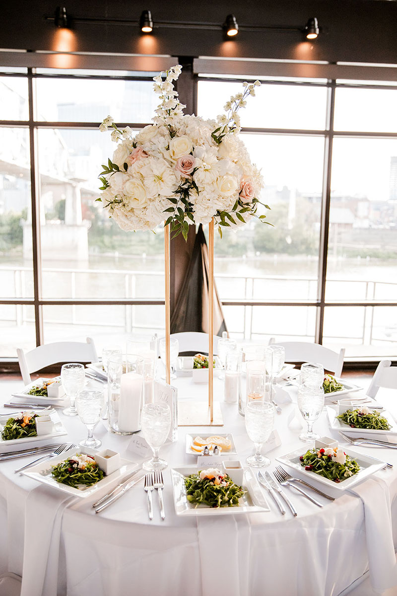 Tall White Centerpiece with Salads at Place Settings