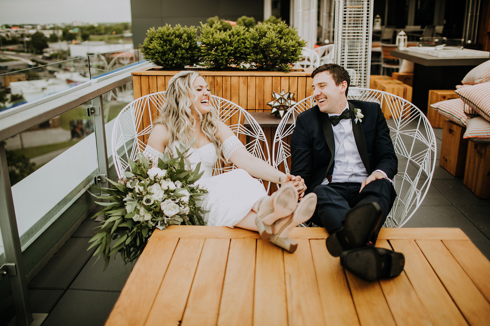 Megan and Taylor With Feet Up on Table