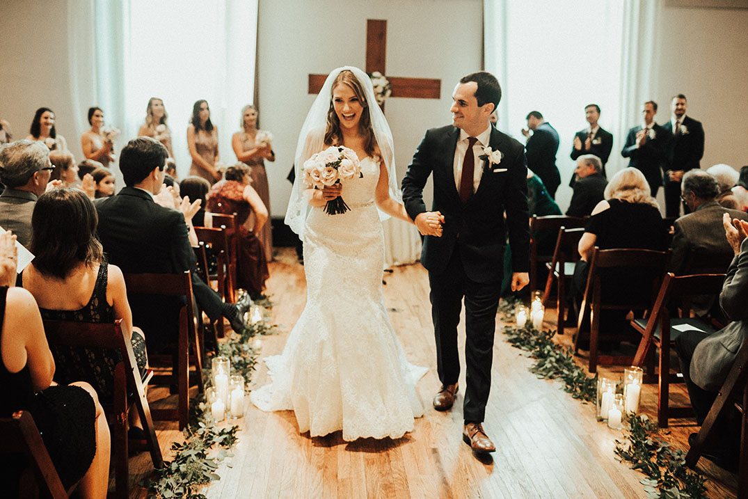 Rebecca and Tyler Walking Down the Aisle