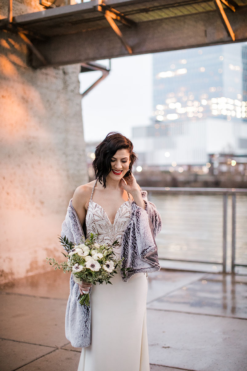 Rebekah Wearing Fur Shrug and Holding Bouquet