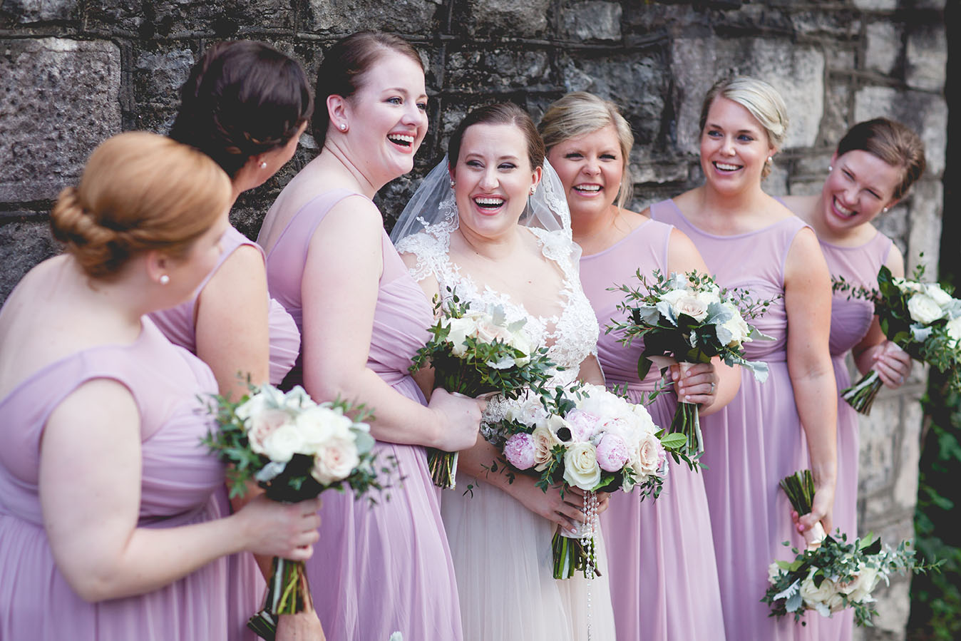 Suzanne Laughing with Bridesmaids