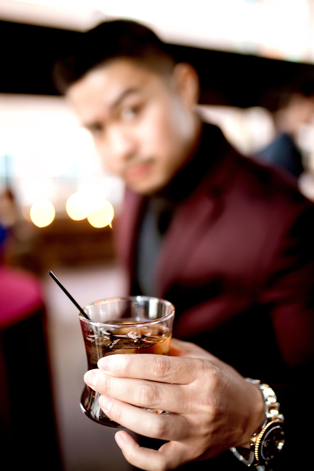 Guest Holding Drink