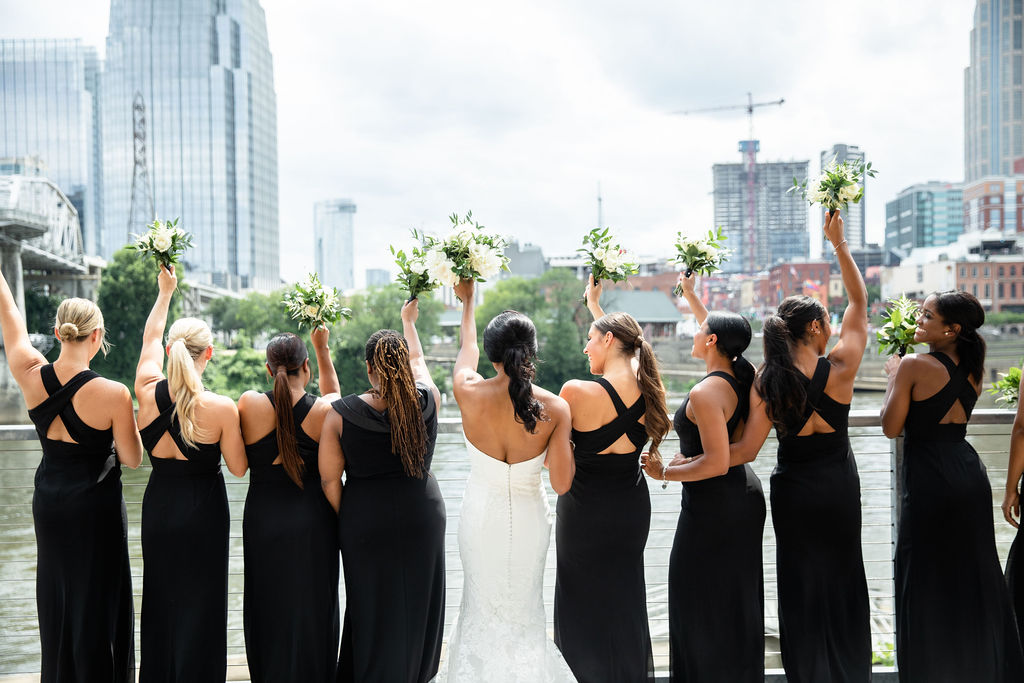 Demetria and Bridesmaids Tossing Bouquets