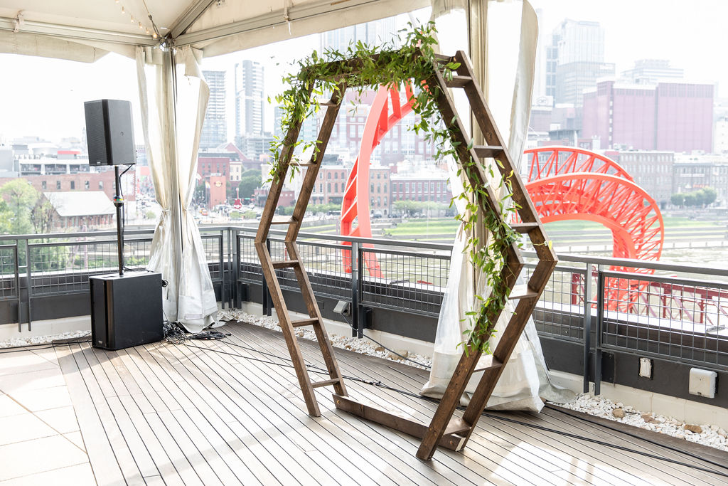 Wooden Geometric Wedding Ceremony Arch with Greenery