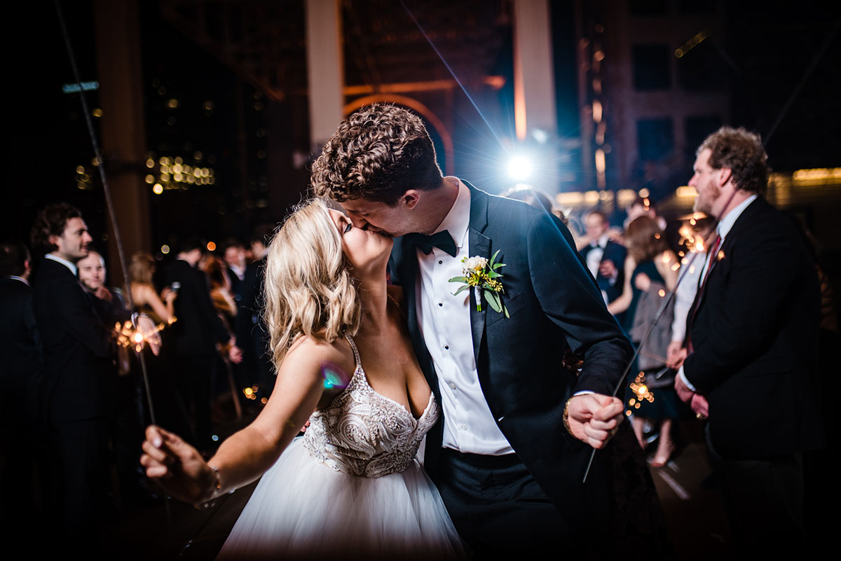 Jordan and Patrick Kissing During Wedding Exit