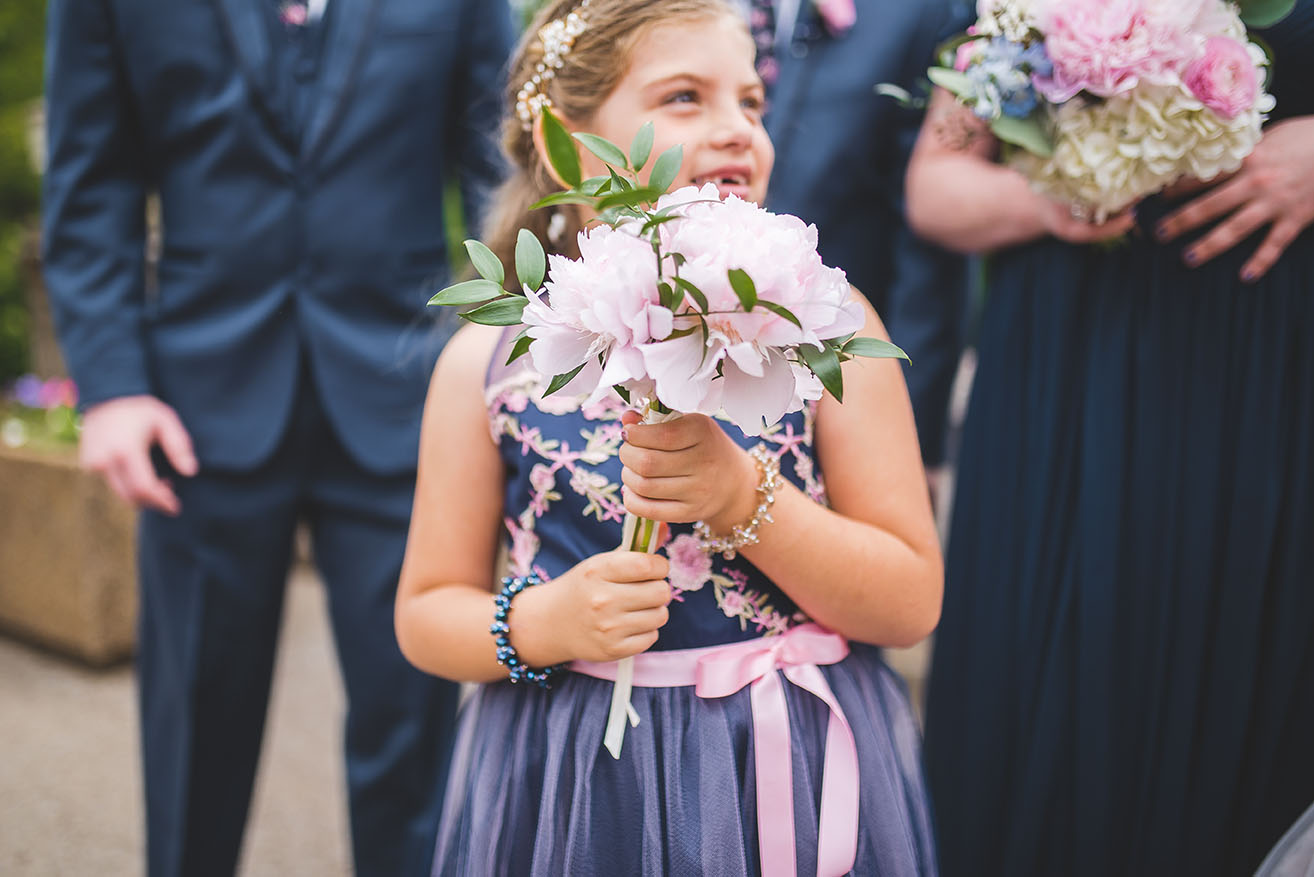 Flower Girl Holding Pink Bouquet