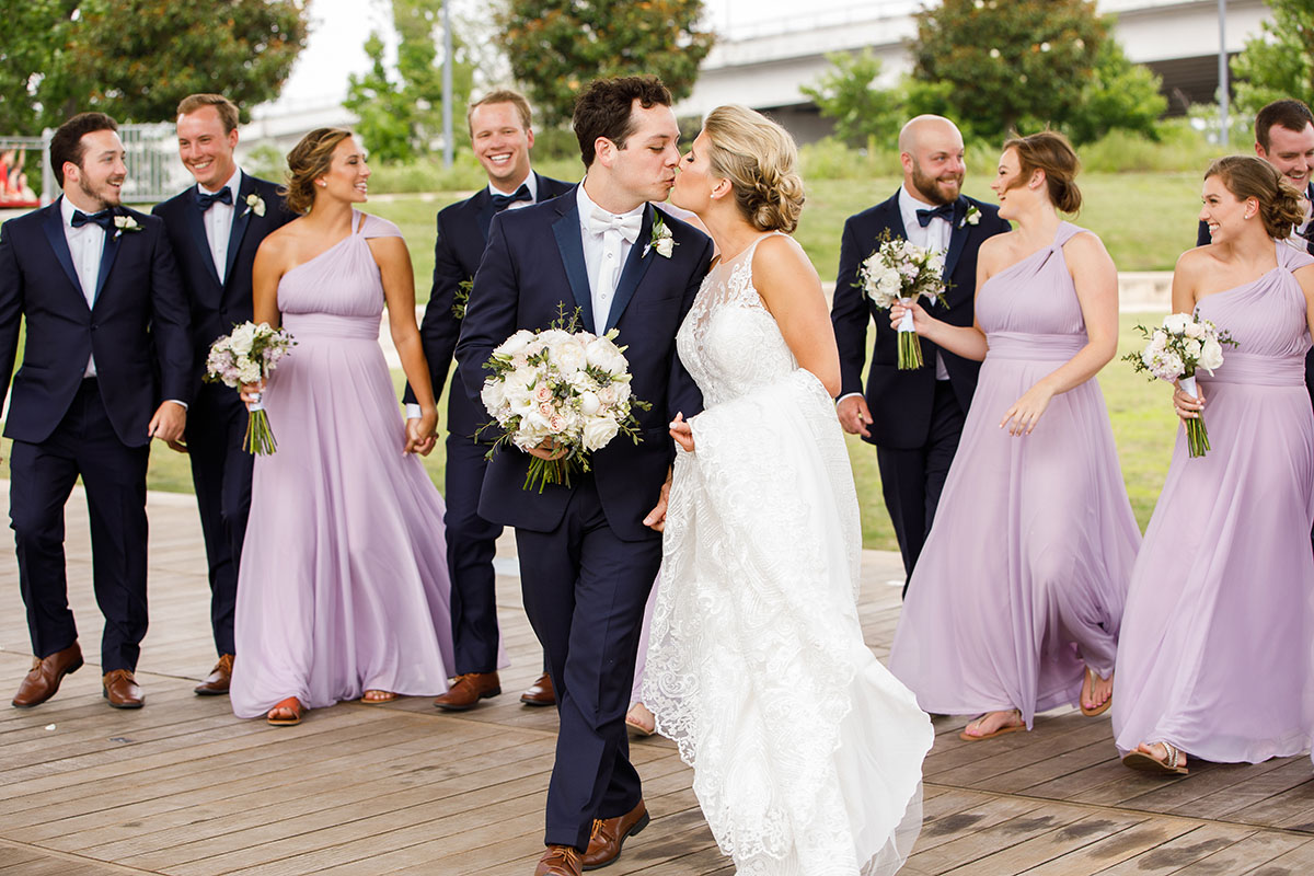 Rachel and Bryan Walking with Wedding Party