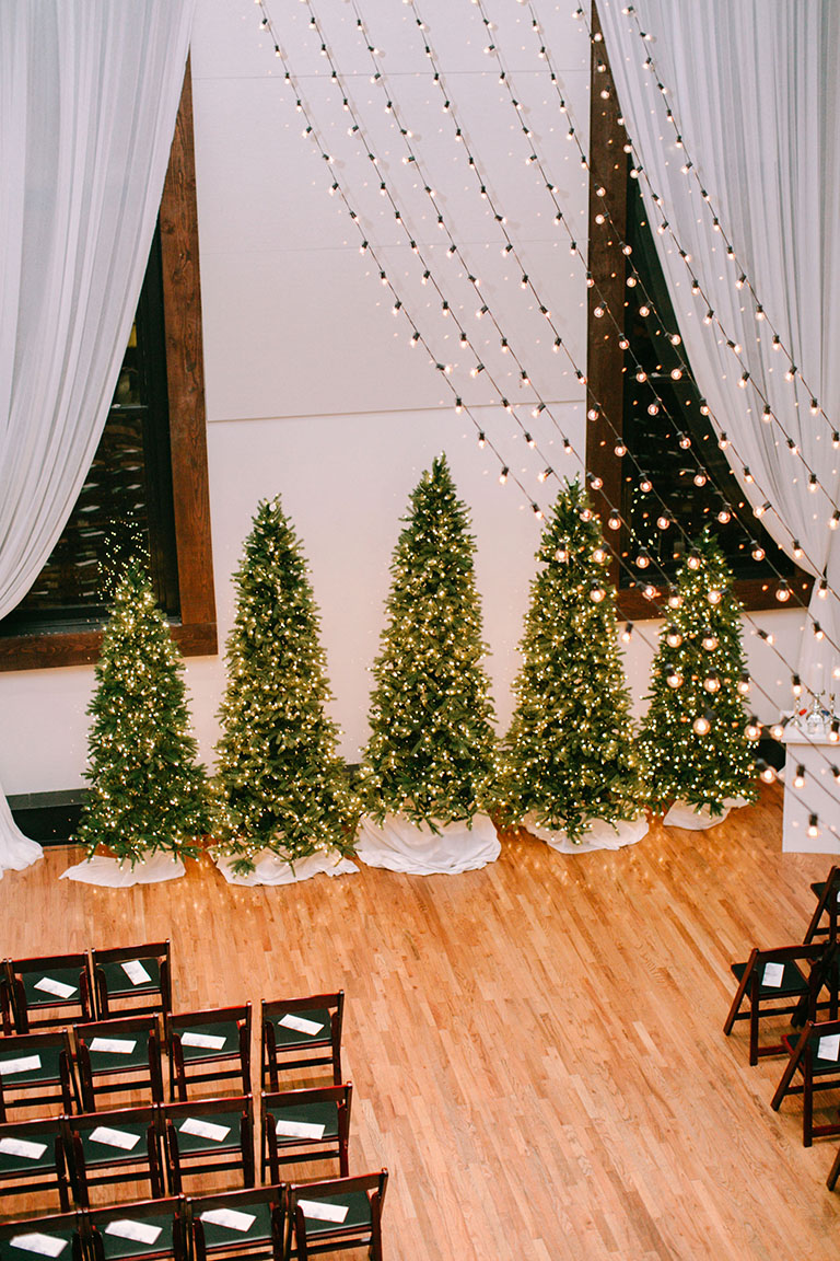 Christmas Wedding Ceremony Altar Setup with Draping and Christmas Trees