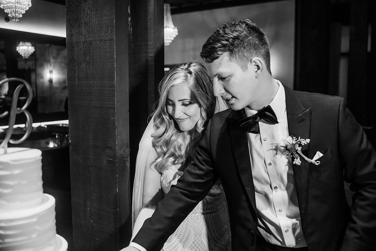 Allie and Tyler Cutting The Cake