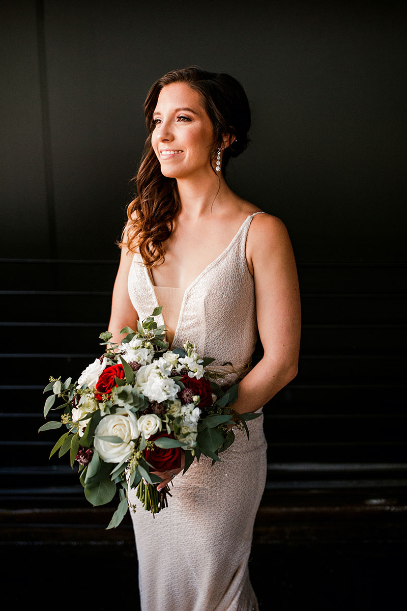 Tess Holding Burgundy Blush Wedding Bouquet