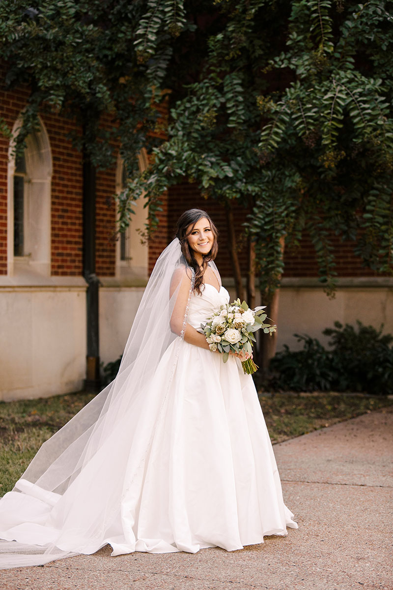 Emily's Holding Bridal Bouquet