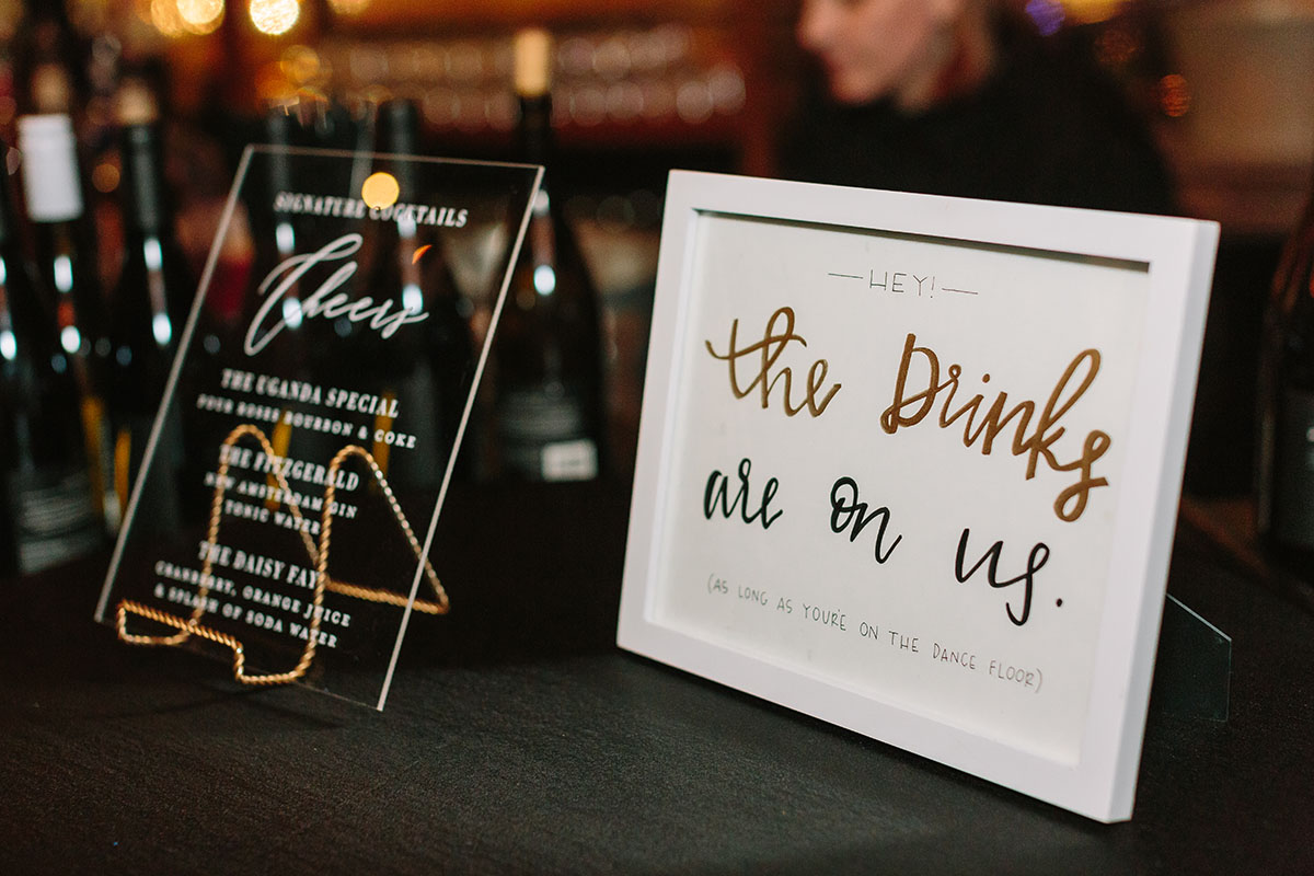 Black and Gold Bar Signage