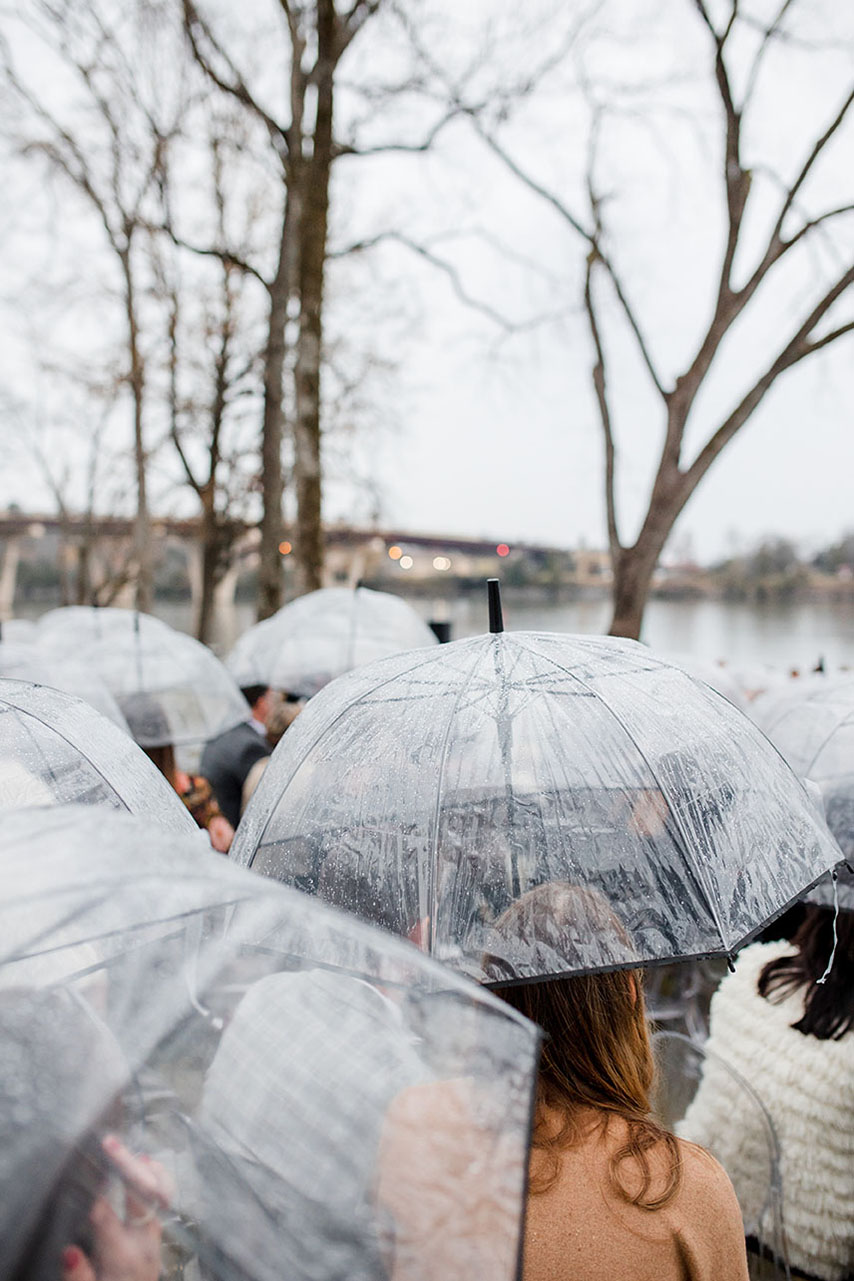 Abbe and Brayden's Guests with Umbrella's During Ceremony