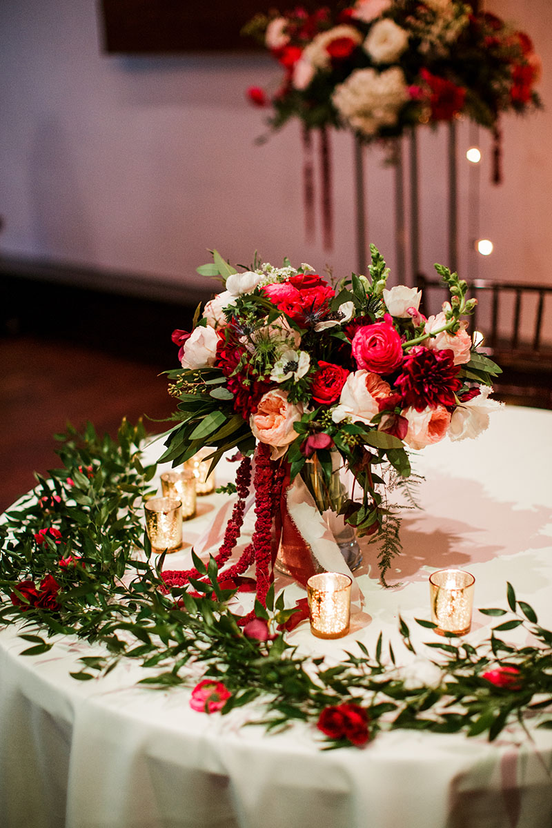 Romantic Winter Wedding Sweetheart Table with Red and Blush Bouquet