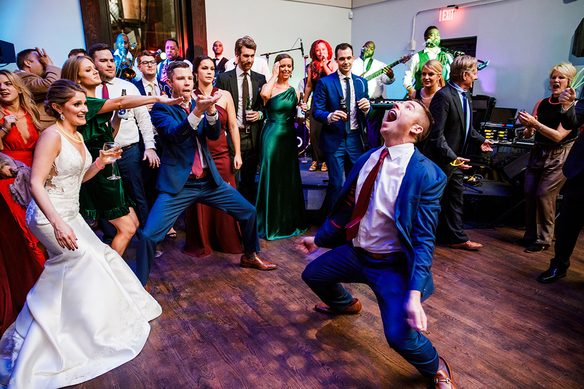 Jenna and Dave Dancing with Guests during Wedding Reception