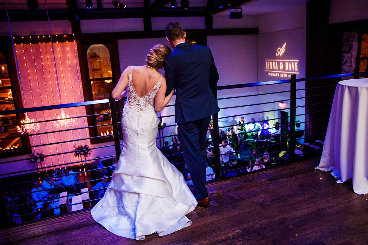 Jenna and Dave on the Mezzanine Looking Down at Guests