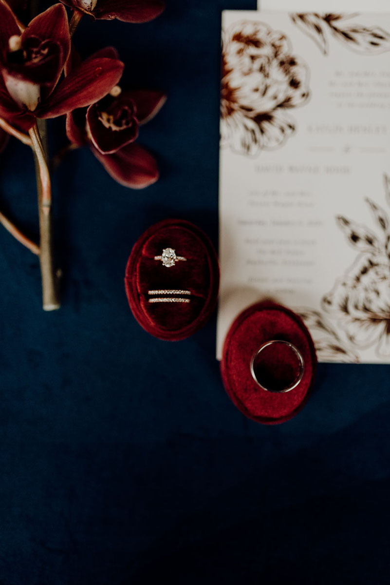 Wedding Rings Sitting in Burgundy Velvet Box