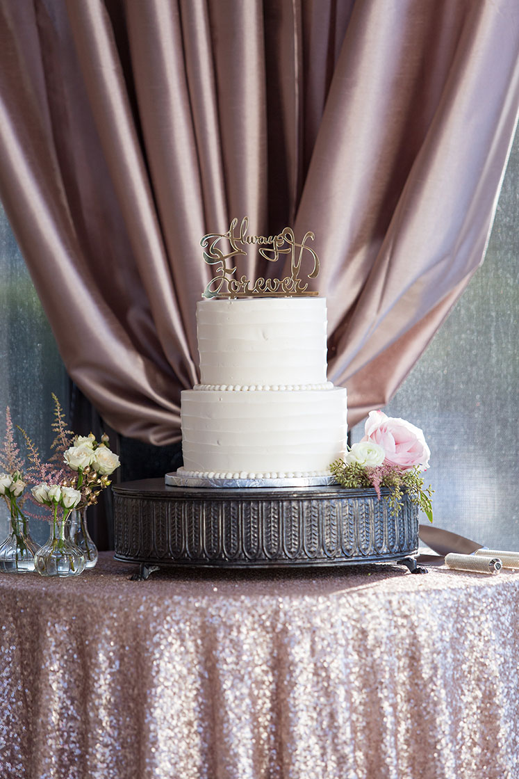 Wedding Cake Table with pink sequin linen