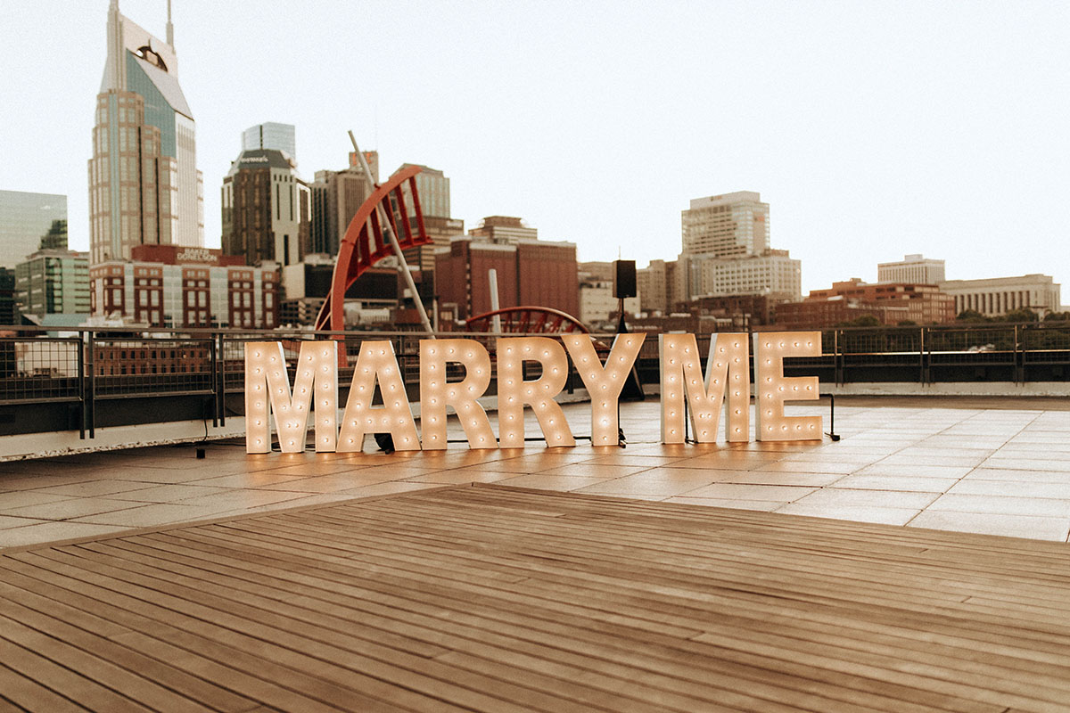 Marry Me Sign on Rooftop