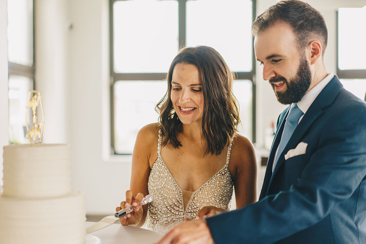 Courtney and Mike Cutting Cake