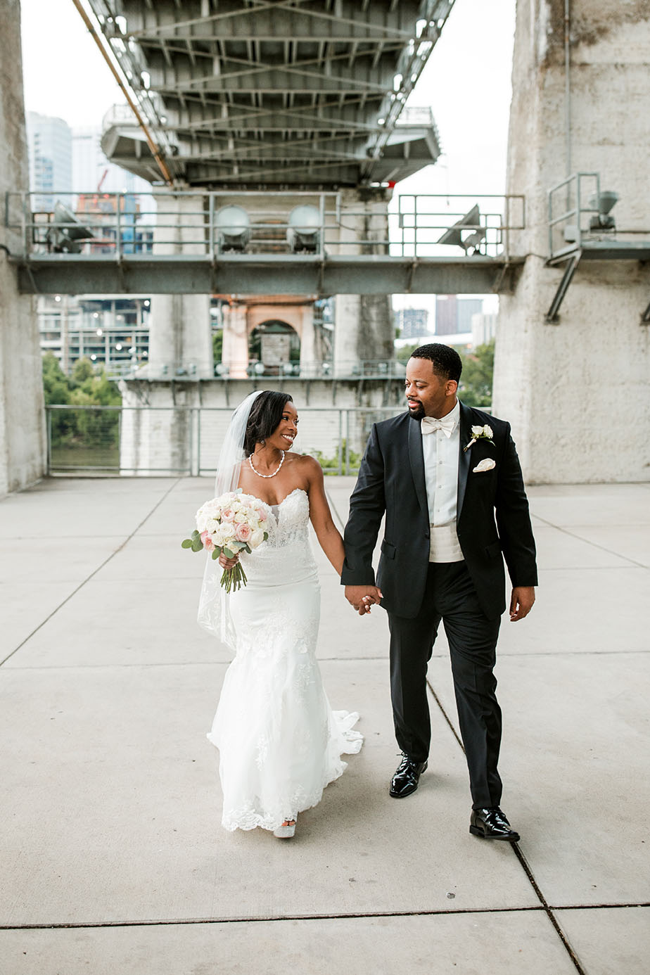 Brandice and Marland Holding Hands Walking