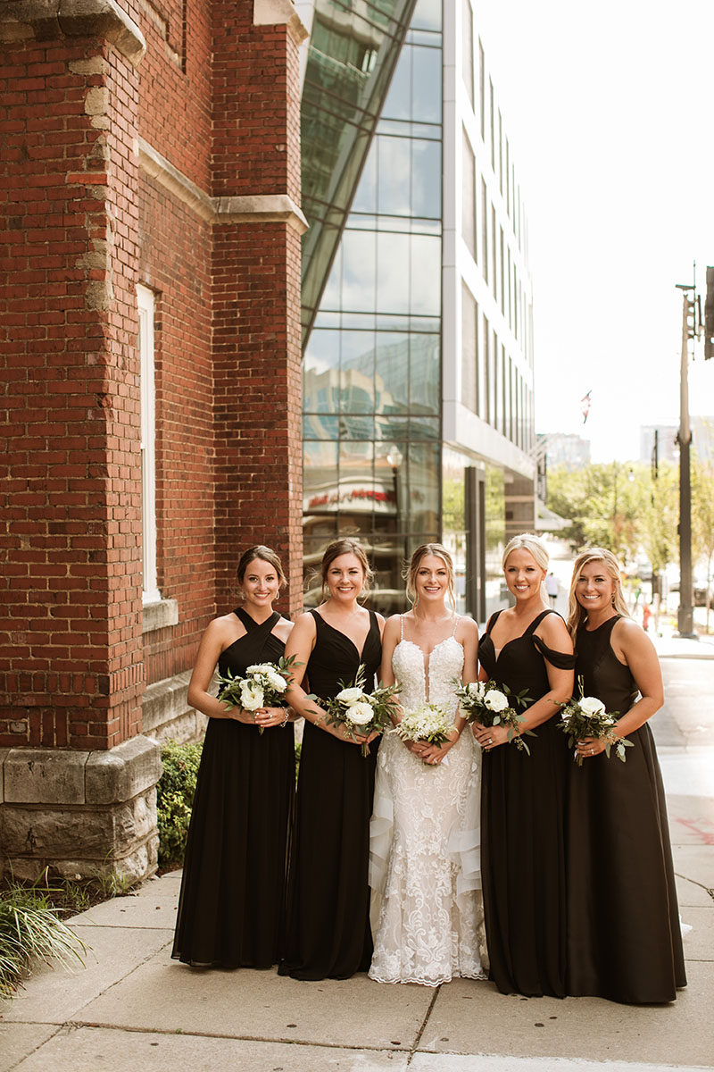 Erica with Bridesmaids in Black Dresses
