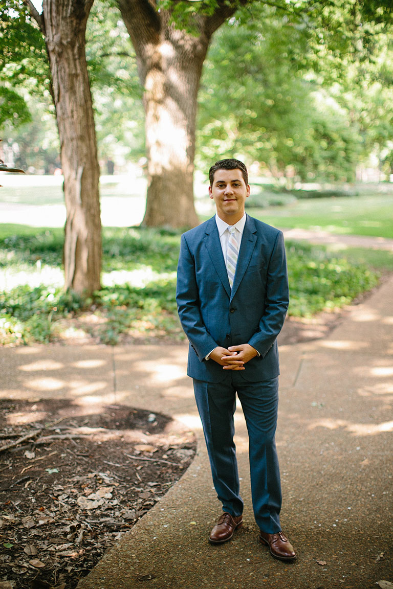 Kevin Standing Outside in Blue Suit