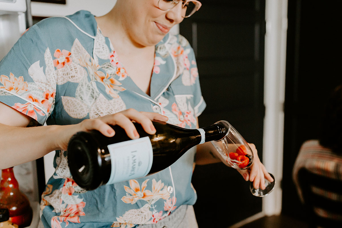 Bridesmaid Pouring Champagne