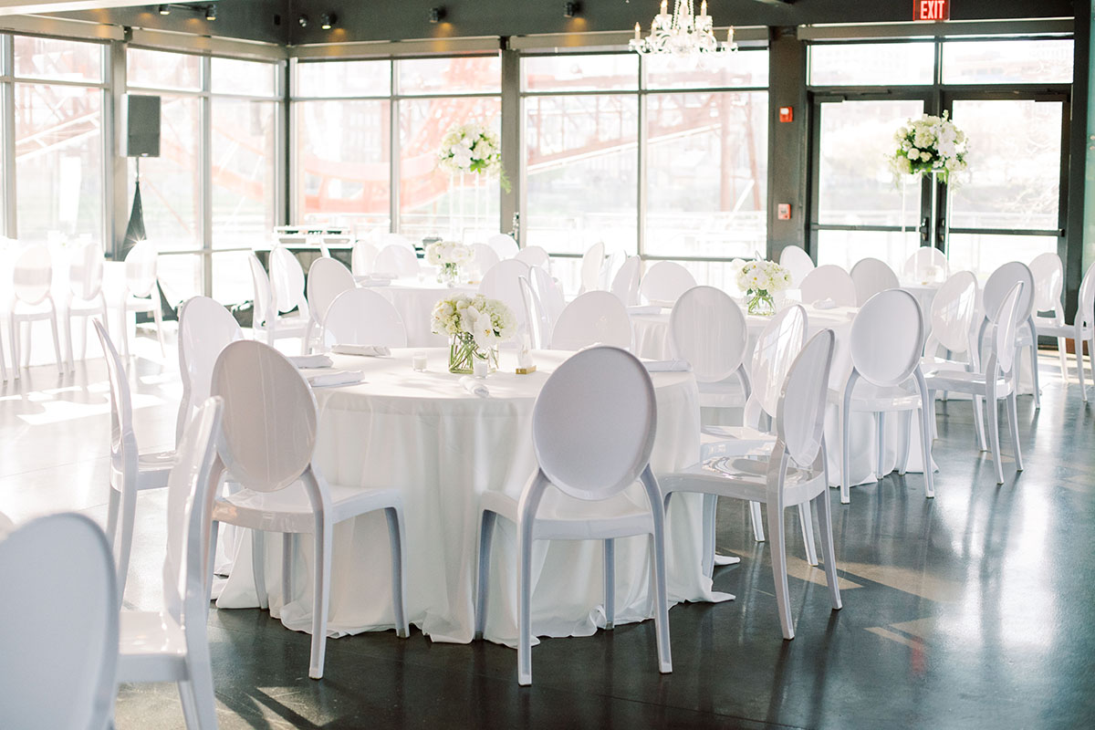 All white modern wedding reception setup at the Bridge Building in downtown Nashville
