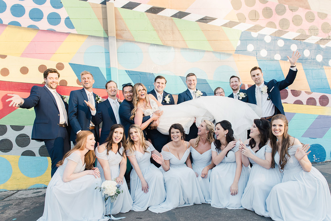 Wedding Party Posing in Front of Mural in the Gulch Neighborhood of Nashville
