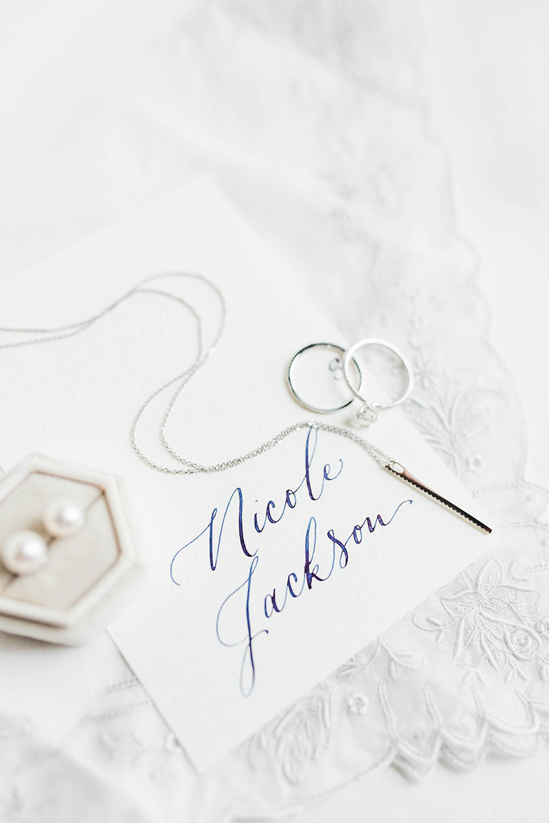 Navy Blue Wedding Calligraphy Flat Lay with Bridal Jewelry