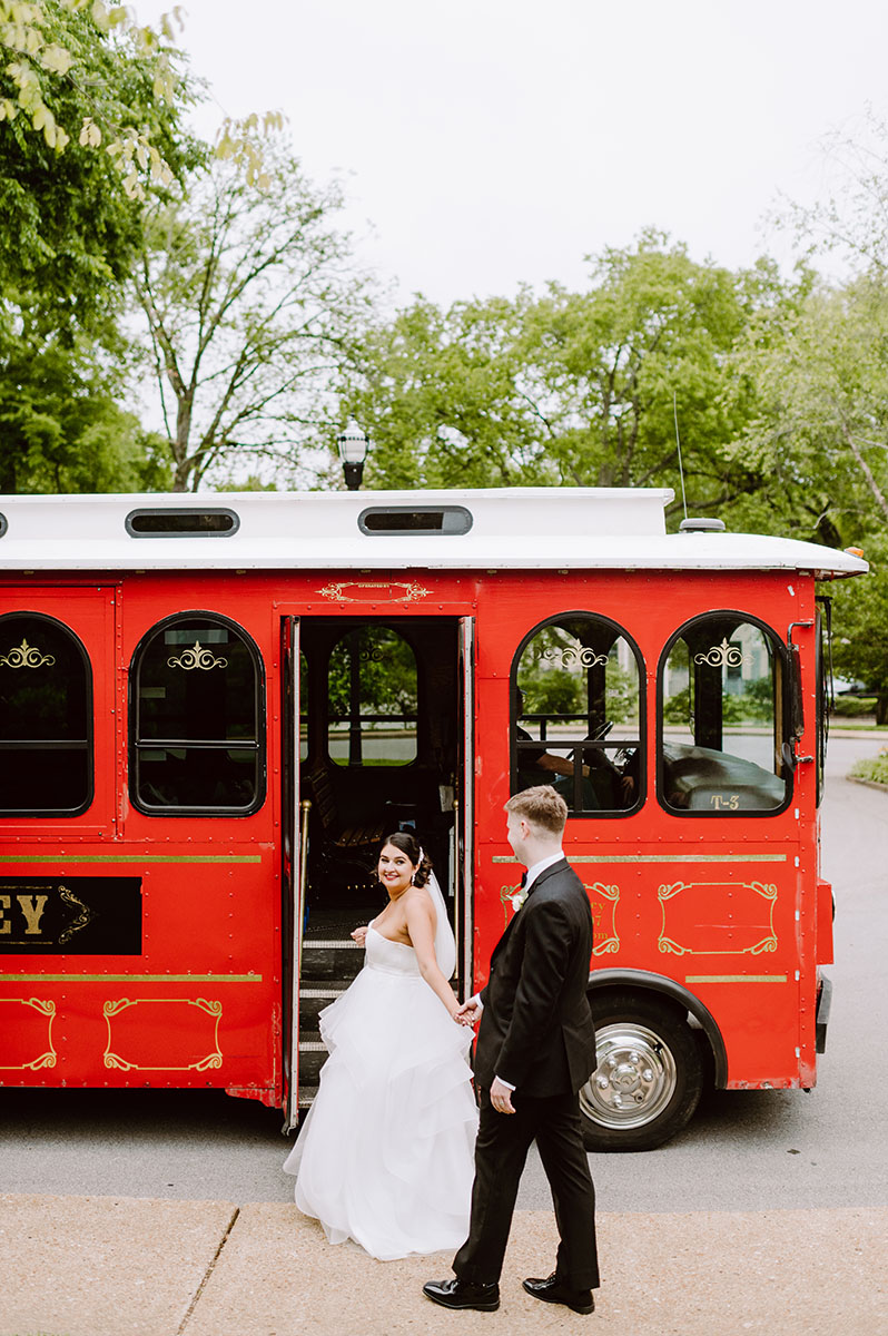 Sarah and Patrick boarding a trolly after their ceremony to head to their wedding reception at the Bell Tower in Nashville